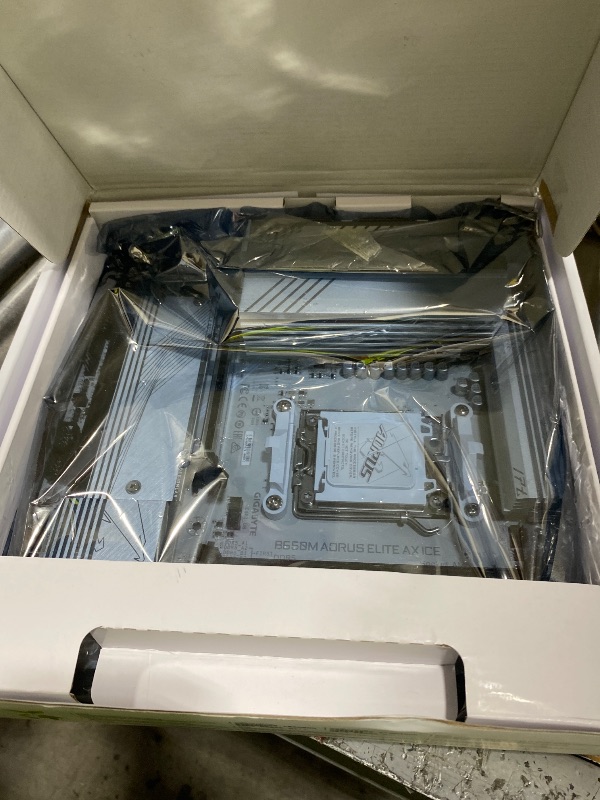 Photo 1 of GIGABTE B650M AORUS Elite AX ICE AMD AM5 mATX Motherboard, Support Ryzen 9000/8000/7000 Series, DDR5, 12+2+2 Power Phase, PCIe 5.0 M.2, USB-C 3.2 Gen 2, WIFI6E, 2.5 GbE, EZ-Latch, Q-Flash, RGB Fusion