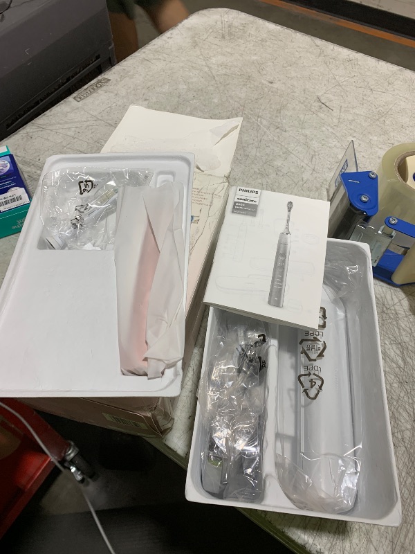 Photo 1 of Philips Sonicare DiamondClean 9000 Electric Toothbrush - Sonic Toothbrush with App, Pressure Sensor, 12 Brushing Settings, Replacement Reminder, Charging Stand, Travel Case, Pink, HX9911/90