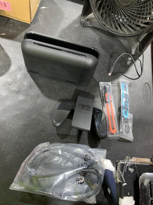 Photo 1 of Nintendo Switch 2 System(System not included view picture only casing and charger)
