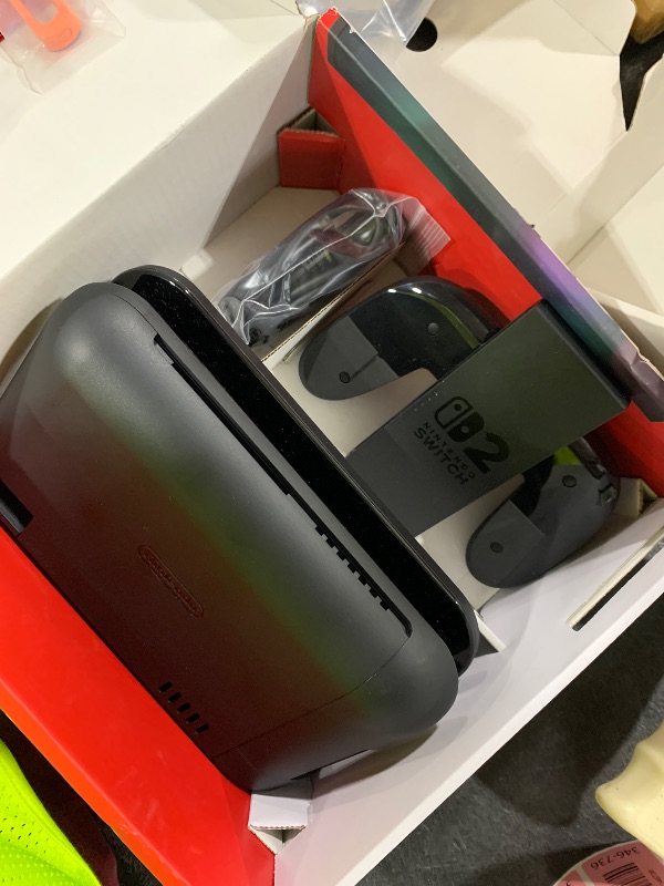 Photo 1 of Nintendo Switch 2 System(System not included view picture only casing and charger)