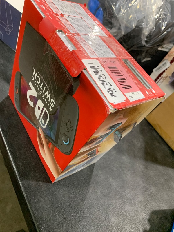 Photo 1 of Nintendo Switch 2 System(System not included view picture only casing and charger)