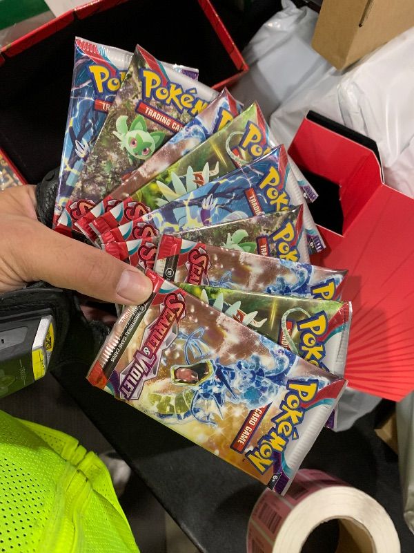 Photo 1 of Pokemon TCG: Scarlet and Violet Elite Trainer Box - Koraidon Red (1 Full Art Promo Card, 9 Boosters and Premium Accessories)