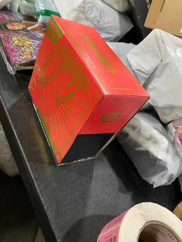 Photo 1 of Pokemon TCG: Scarlet and Violet Elite Trainer Box - Koraidon Red (1 Full Art Promo Card, 9 Boosters and Premium Accessories)