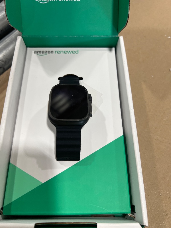 Photo 1 of Apple Watch Ultra 2 (GPS + Cellular, 49MM) - Black Titanium Case with Black Ocean Band (Renewed Premium)