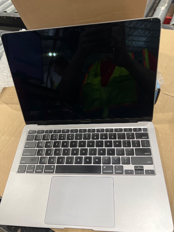Photo 1 of Apple 2020 MacBook Air with 1.1GHz Intel Core i3, 13-inch, 8GB RAM, 128GB SSD Storage Space Gray (Renewed)