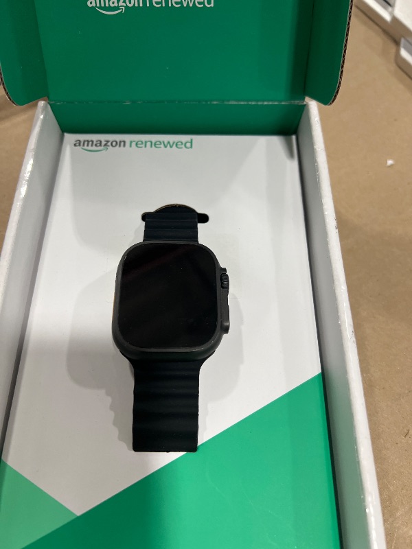 Photo 1 of Apple Watch Ultra 2 (GPS + Cellular, 49MM) - Black Titanium Case with Black Ocean Band (Renewed Premium)