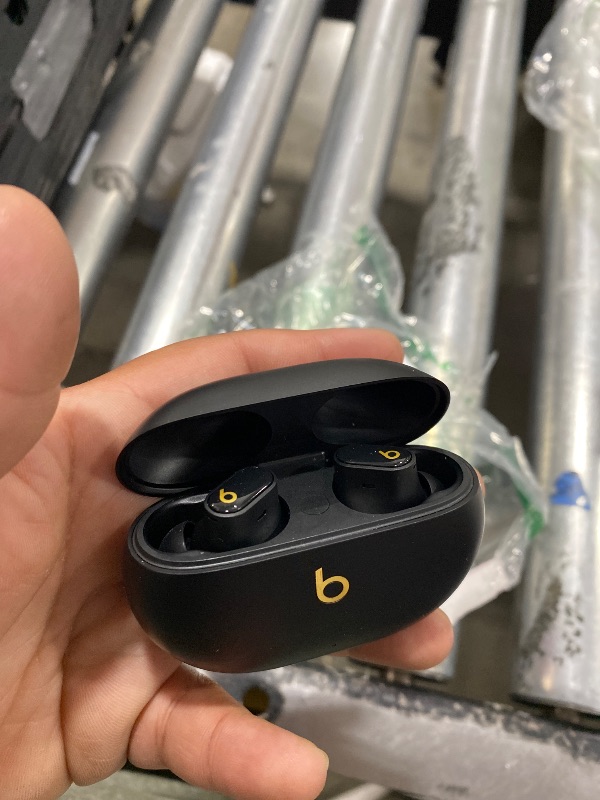 Photo 1 of Beats Studio Buds + | True Wireless Noise Cancelling Earbuds, Enhanced Apple & Android Compatibility, Built-in Microphone, Sweat Resistant Bluetooth Headphones, Spatial Audio - Black/Gold