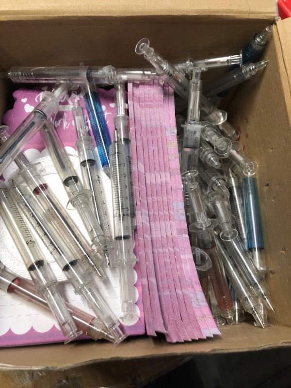 View 2 of * MANY PENS MISSING THE SYRINGE COLORATION* Qeeenar 48 Set Nurses Nurse Week Notepads with Syringe Ballpoint Pens OT Month Ribbons Funny CNA Sticky Note Memo Note Pad Nursing Student Appreciation Essentials Gifts for Hospital