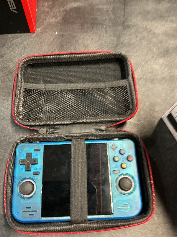 Photo 1 of ***MISSING PARTS***
RF40H Handheld Game Console, 4.0" Retro Gaming Console Preloaded 20,000+ Classic Games, Open Source Linux System, Support WiFi Online Play, Portable Pocket Hand Held Video Game (Transparent Blue)