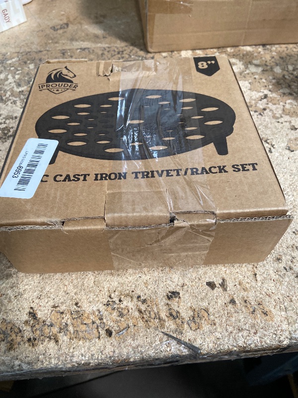 Photo 1 of (1 pc) IPROUDER Cast Iron Trivet 2 PCS Set, 8-inch, Meat Rack, Cast Iron Grate for Dutch Ovens, Raise Food in Dutch Oven, Used as Burner Diffuser, Use Directly on Camp Fire, Used as Trivet on Table