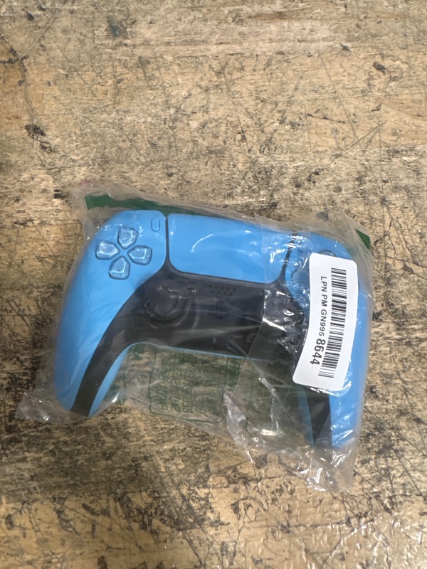Photo 1 of **POWERS ON** PlayStation Sony DualSense Wireless Controller 5 - Starlight Blue (Renewed)