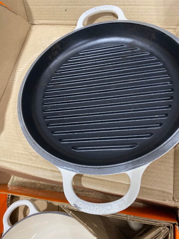 Photo 1 of **HANLDE DAMAGED** Le Creuset Enameled Cast Iron Multifunction Braiser with Grill Pan Lid, 3.5 qt., Meringue