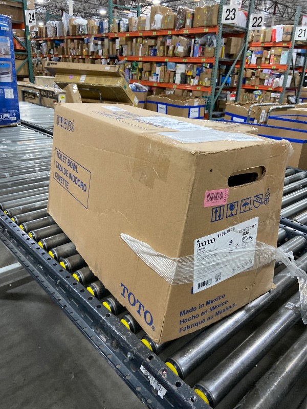 Photo 1 of TOTO Drake Elongated TORNADO FLUSH Toilet Bowl with CEFIONTECT, Cotton White - C776CEG#01