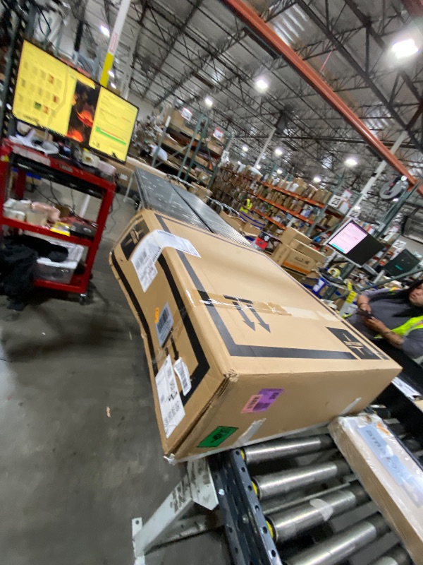 Photo 1 of Medline Comfortable Folding Wheelchair with Swing-Back, Desk-Length Arms and Elevating Footrests, 20”W x 16”D Seat