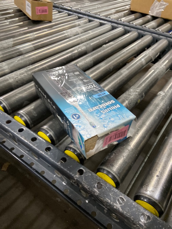 Photo 1 of Philips Sonicare 4100 Series Electric Toothbrush - Sonic Toothbrush with Advanced Sonic Technology, Pressure Sensor, Two Intensity Settings, Smartimer & Quadpacer, Black, Model HX3681/24