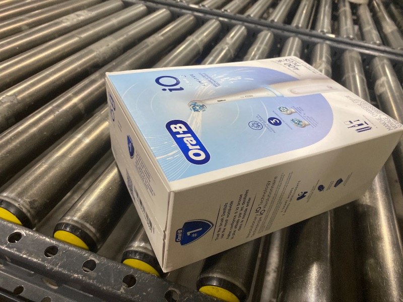 Photo 1 of Oral-B Rechargeable Electric Toothbrush, iO3 Limited Deep Clean, 3 Cleaning Modes, Visual Pressure Sensor to Protect Gums, 2 Brush Heads, Travel Case, White