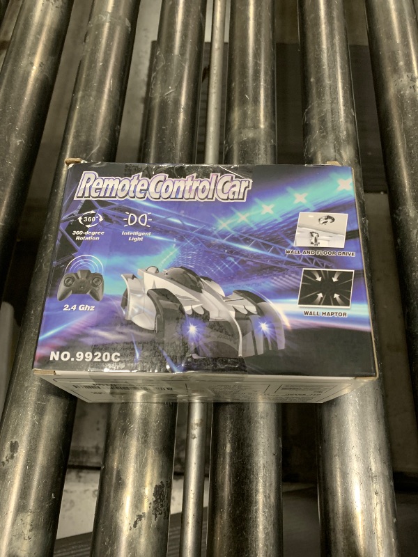 Photo 1 of FirYawee Wall Climbing Remote Control Car, 360° Rotating RC Stunt Car with Headlight, Rechargeable RC Cars Toys for 3 4 5 6 7 8-12 Year Old Boys Girls Kids