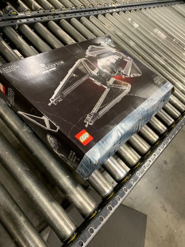 Photo 1 of LEGO Star Wars Ultimate Collector Series TIE Interceptor Model Building Set, Star Wars Collectible with TIE Pilot Minifigure, Creative Build and Display Starfighter Set for Adults and UCS Fans, 75382