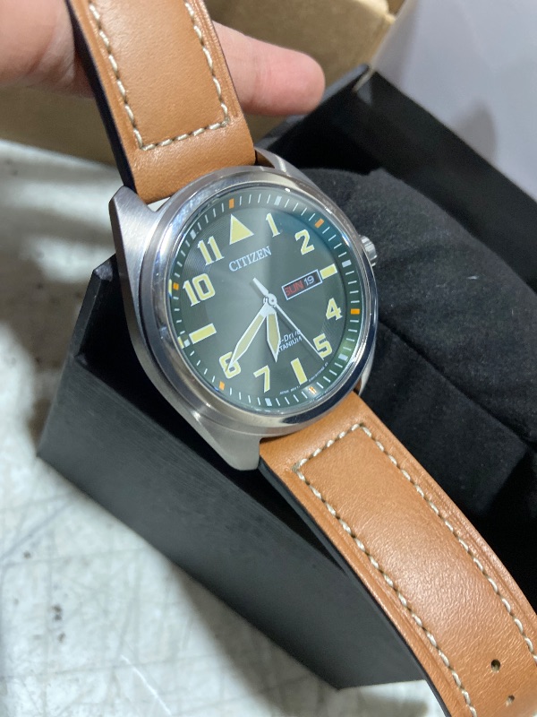 Photo 1 of Citizen Men's Eco-Drive Weekender Garrison Field Watch in Super Titanium with Brown Leather Strap, Green Dial (Model: BM8560-02X)