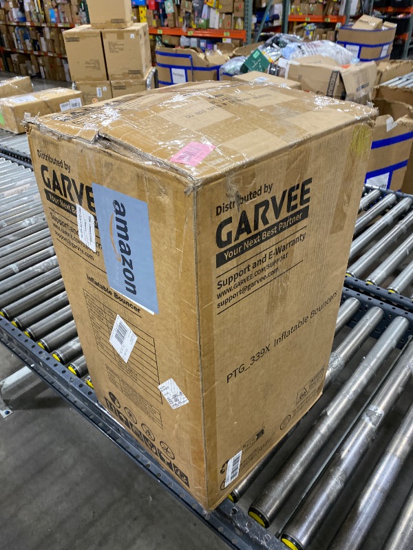 Photo 1 of Garvee Inflatable Bounce House for Kids,14ft x 10ft Indoor Outdoor Bounce Castle 12-in-1 with 450W Blower and Slide, Jump House for Backyard Party Family Gatherings