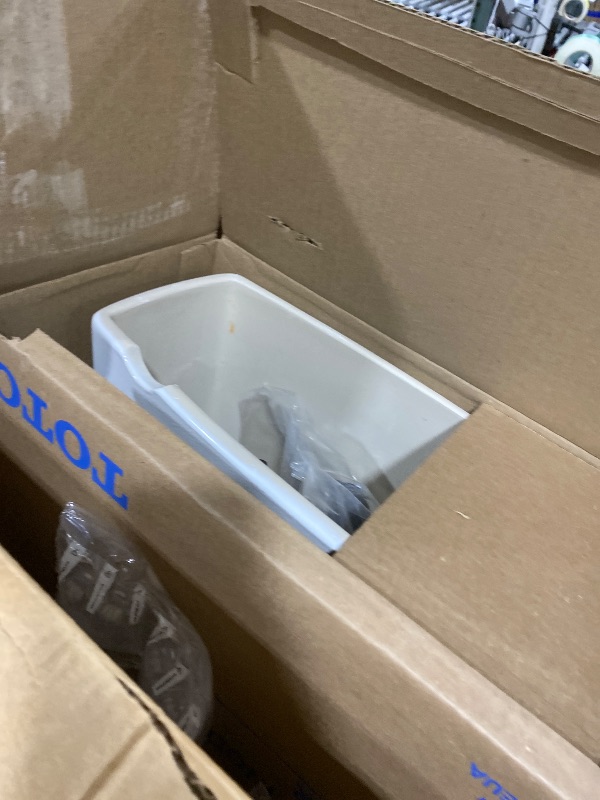 Photo 1 of TOTO Drake Transitional Two-Piece Elongated 1.28 GPF Universal Height TORNADO FLUSH Toilet with CEFIONTECT, Cotton White - CST786CEFG#01