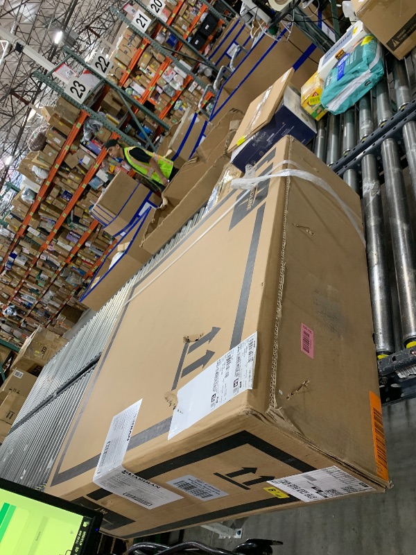 Photo 1 of Medline Comfortable Folding Wheelchair with Swing-Back, Desk-Length Arms and Elevating Footrests, 20”W x 16”D Seat