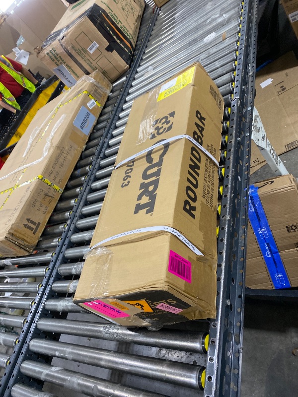 Photo 1 of CURT 17063 Round Bar Weight Distribution Hitch with Integrated Lubrication and Sway Control, Up to 14K, 2-In Shank, 2-5/16-Inch Ball