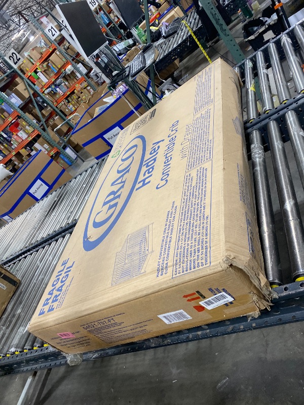 Photo 1 of Graco Hadley 5-in-1 Convertible Crib with Drawer – GREENGUARD Gold Certified, Fits Standard Crib Mattress, Converts to Toddler Bed, Daybed and Full Bed, 4 Adjustable Mattress Heights (Driftwood)