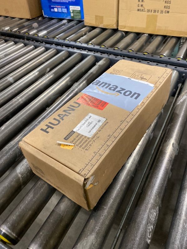 Photo 1 of HUANUO FlowLift™ Single Monitor Mount, 13 to 32 Inch Monitor Arm, Adjustable Monitor Stand, Vesa Mount with Clamp and Grommet Base - Fits 4.4 to 19.8lbs LCD Computer Monitors