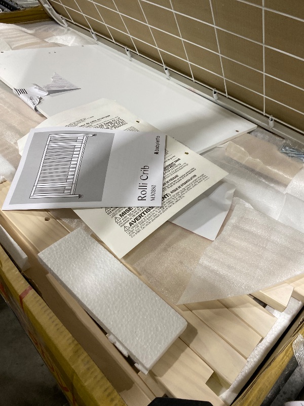 Photo 1 of Babyletto Rolli 9-in-1 Convertible All-Stages® Bassinet to Full-Size Crib in Washed Natural, Greenguard Gold Certified, Portable & Adjustable with Select Conversion kit and Pads Included