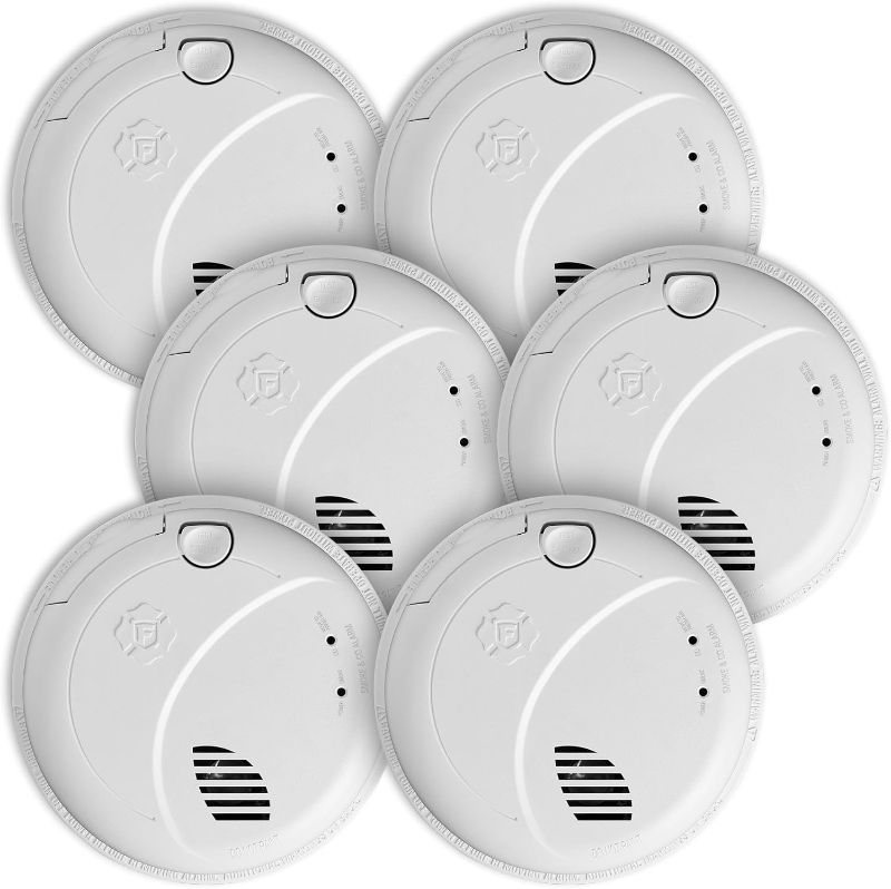 Photo 1 of First Alert SMCO100V-AC, Interconnect Hardwire Combination Smoke & Carbon Monoxide Alarm with Battery Backup and Voice & Location Alerts, 6-Pack