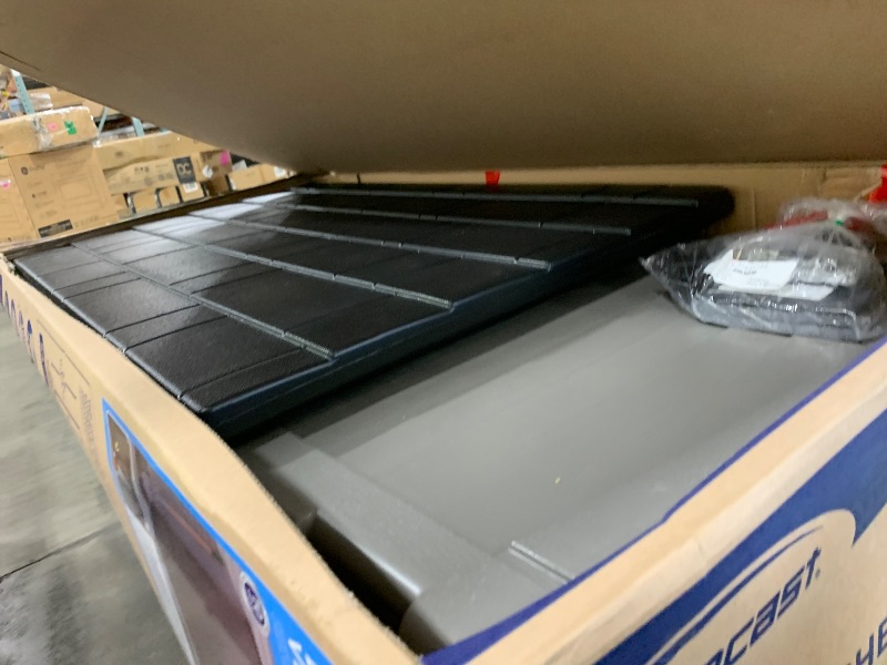 Photo 1 of Suncast Outdoor Storage Cabinet Waterproof Resin Vertical Outdoor Storage Shed (54 cu. ft.) for Patio, Garden Tools, Cushions, & Equipment. Weatherproof Plastic Multi-Wall Design, Capacity Made in USA