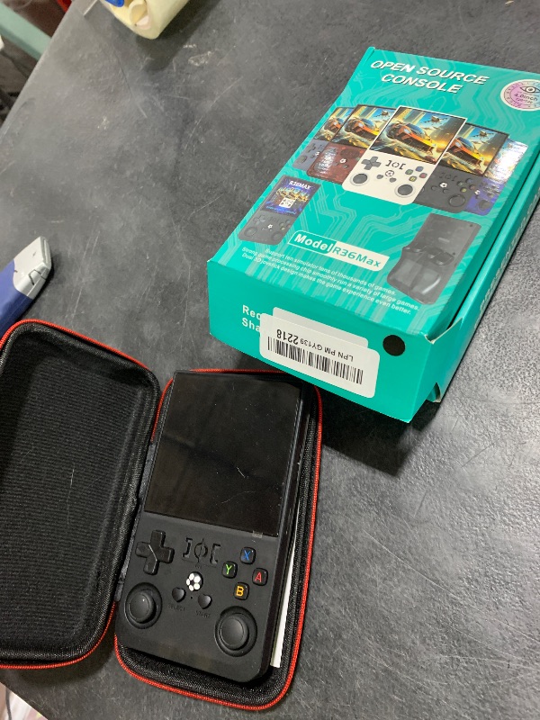 Photo 1 of ****NONFUNCTIONAL FOR PARTS ONLY******
R36MAX Retro Handheld Gaming Console, Built-in 22,000+ Classic Games, Open Source Linux System, Portable Game Emulator Console, 4.0-Inch 4K HD IPS Screen Video Player, 4000mAh Battery (Black 128GB)