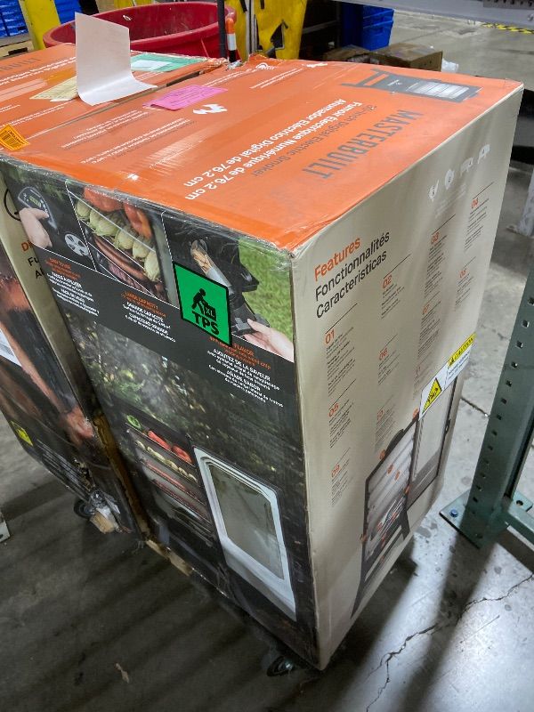 Photo 1 of Masterbuilt® 30-inch Digital Electric Vertical BBQ Smoker with Leg Kit, Side Wood Chip Loader and 710 Cooking Square Inches in Black, Model MB20070421