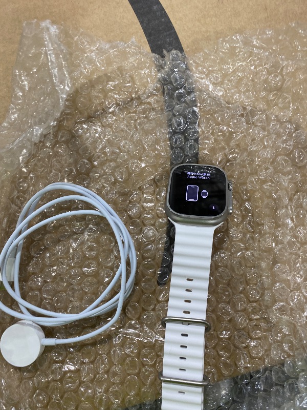Photo 1 of Apple Watch Ultra 2 [GPS + Cellular, 49mm] - Titanium Case With White Ocean Band, One Size (Renewed)