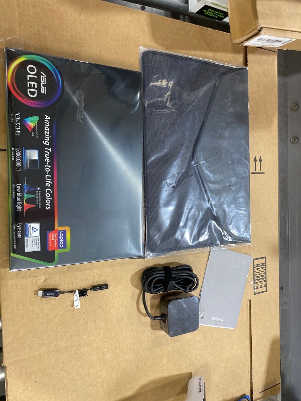 Photo 1 of ASUS ZenBook 13 Ultra-Slim Laptop, 13.3 OLED NanoEdge, Intel Evo Platform i5-1135G7, 8GB LPDDR4X RAM, 256GB SSD, Thunderbolt 4, Wi-Fi 6, Windows 11 Home, AI Noise-Cancellation, Pine Grey, UX325EA-DH51