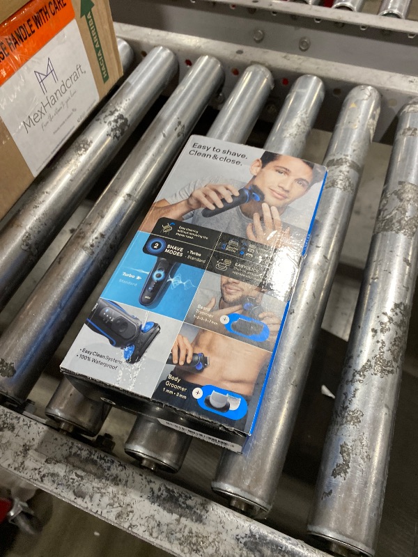 Photo 1 of Braun Electric Shaver for Men, Series 5 5150cs, Wet & Dry Razor, Turbo Shaving Mode, Foil Shaver, with Beard Trimmer, Body Groomer and Charging Stand, Blue