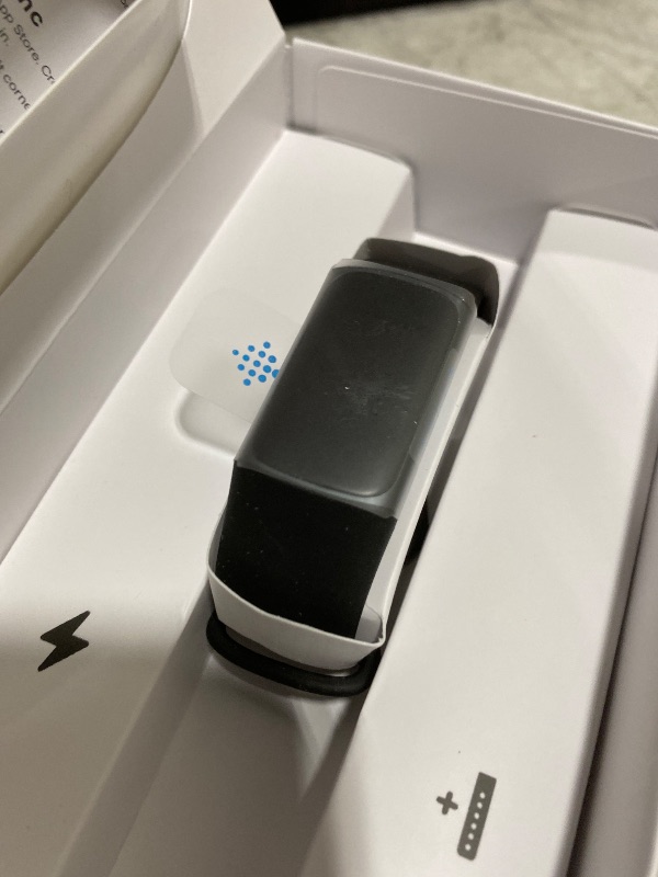 Photo 1 of Fitbit Charge 5 Advanced Fitness Tracker with GPS, Heart Rate, Sleep & Health Tracker - Power Bundle with Adapter (Graphite Stainless Steel)