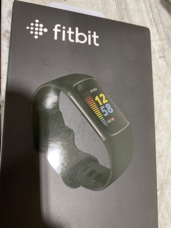 Photo 1 of Fitbit Charge 5 Advanced Fitness Tracker with GPS, Heart Rate, Sleep & Health Tracker - Power Bundle with Adapter (Graphite Stainless Steel)