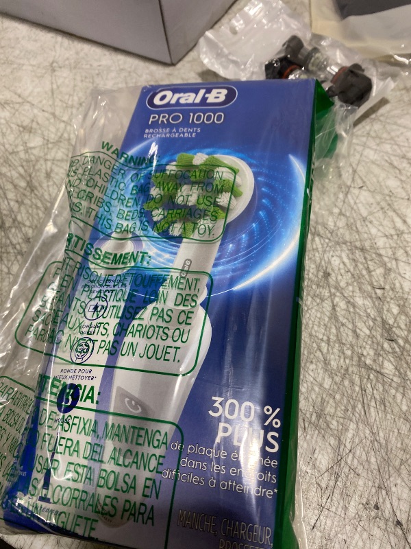 Photo 1 of Oral-B Pro 1000 Rechargeable Electric Toothbrush, White