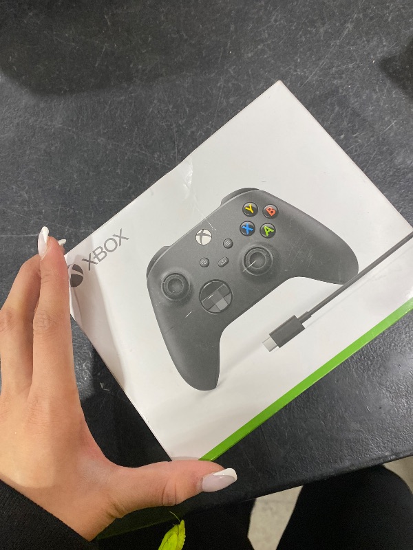 Photo 1 of Xbox Wireless Gaming Controller + USB-C® Cable (2025) – Carbon Black – Play on Xbox, Windows, Android, iOS, FireTV Sticks, Smart TVs, VR Headsets