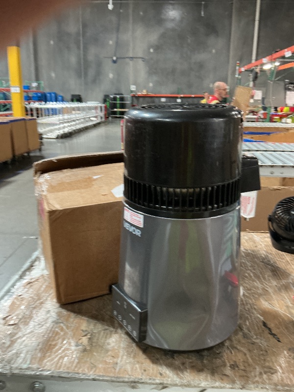 Photo 1 of ***DENTED AND DAMAGED***
VEVOR 1750W Water Distiller, 0.4Gal/H Distilled Water Maker with Glass Carafe, 4L/1.1Gal Countertop Distiller Machine, 0-99H Time Temp Dual Display, Anti-Dry Design 304 Stainless Steel Still, Grey