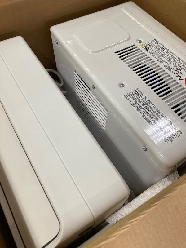 Photo 1 of ***DAMAGED -BOTTOM CORNER DENT/BENT INWARD***SELLING AS IS *** Midea 6,000 BTU U Shaped Smart Inverter Window Air Conditioner - Cools 250 Sq Ft, Ultra Quiet with Open Window Operation - Alexa/Google Assistant Compatible, 37% Energy Savings, Remote (2026 E