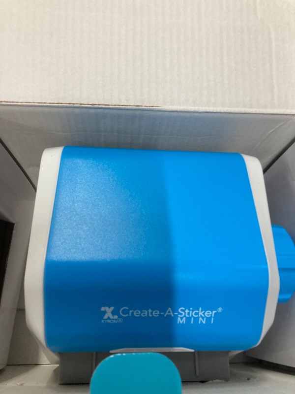 Photo 1 of **LABEL MAKER ONLY***Xyron Create-a-Sticker, 5" Sticker and Label Maker Machine for Small Business and DIY Crafts, Includes Permanent Adhesive, Pre-Loaded (0501-05-10A)