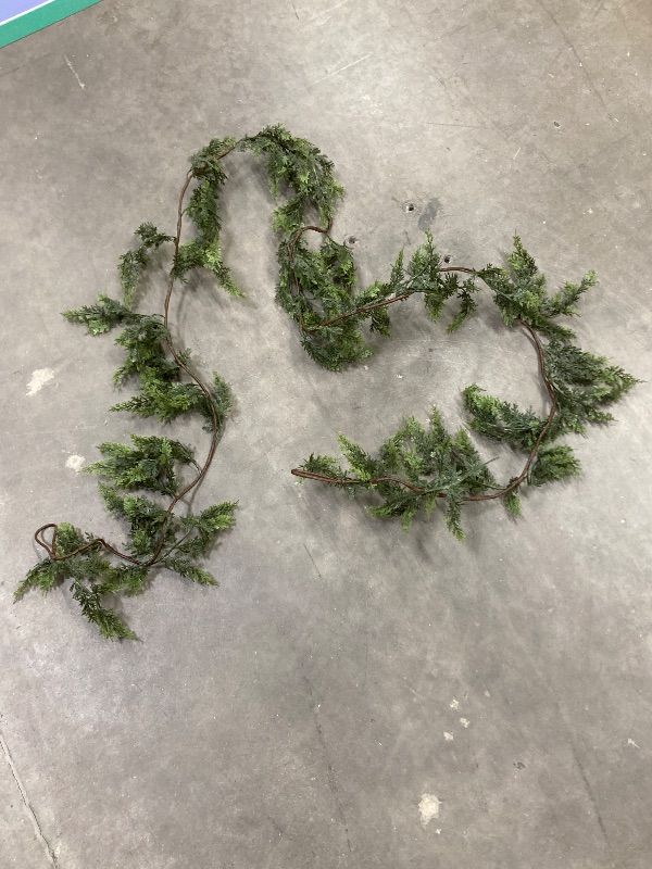 Photo 1 of ***MISSING BRANCHES -SELLING AS IS*** 6FT Thick Christmas Garlands with 168 Cedar Branches, Real Touch Green Cedar Garland for Christmas Decorations, Artificial Greenery Garland for Table, Mantle, Wall, Indoor, Outdoor Holiday Decor