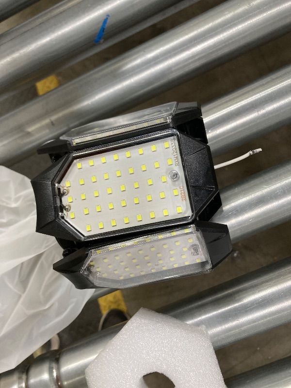 Photo 1 of ***DAMAGE -SELLING AS IS *** POLARPRA LED Garage Lights - 30000LM Super Brighter Garage Lighting w/ 6 Deformable Panels 6500K Led Shop Lights E26 Screw in Base for Basement Workshop Warehouse Attic - 2Pack