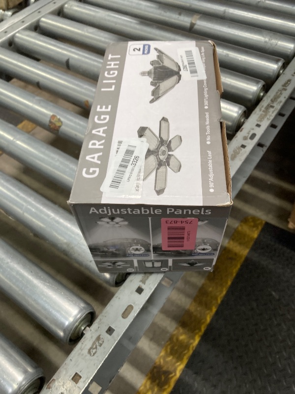Photo 1 of ***DAMAGE -SELLING AS IS *** POLARPRA LED Garage Lights - 30000LM Super Brighter Garage Lighting w/ 6 Deformable Panels 6500K Led Shop Lights E26 Screw in Base for Basement Workshop Warehouse Attic - 2Pack