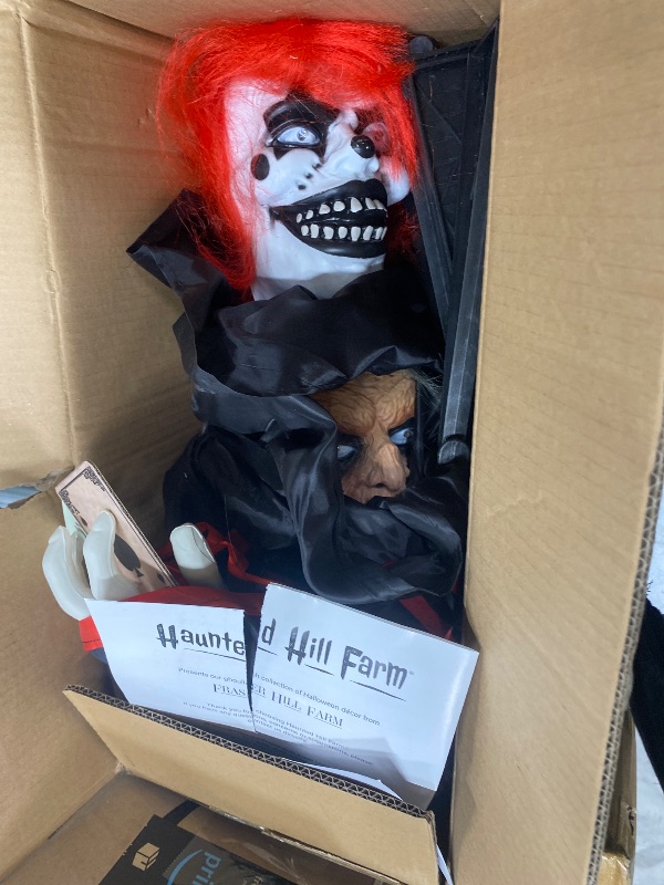 Photo 1 of  Hanging Animated Talking Clown Decoration ,Perfect Halloween Haunted House Prop Décor, Indoor/Outdoor Hanging Display for Lawn and Party.