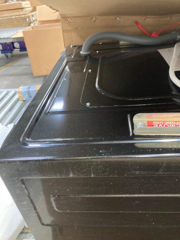 Photo 1 of *Scratches* Combo Washer and Dryer, Black