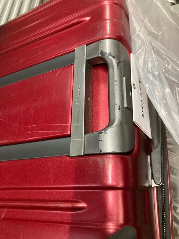 Photo 1 of *Scratches* * Damage to bottom wheel* DELSEY PARIS Titanium Hardside Expandable Luggage with Spinner Wheels Checked Luggage, Black Cherry Red, Checked-Large 29 Inch